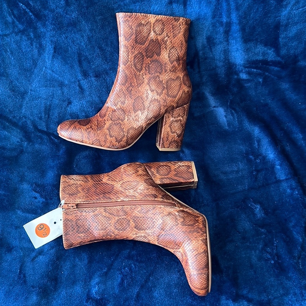 New heeled boots still with tag